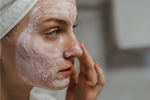 A Woman practicing Korean Beauty Routine For Glass Skin. 
